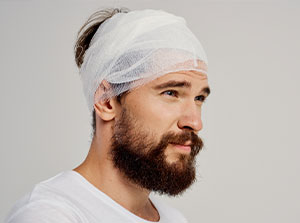 victim of auto accident injuries in Sacramento suffering from concussion