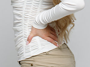 victim of auto accident injuries in Sacramento suffering from pinched nerve