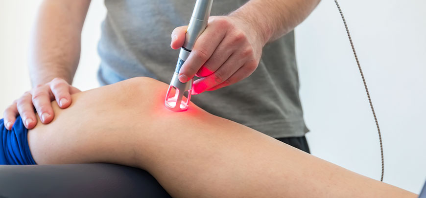 patient receiving cold laser therapy in Sacramento for auto accident injuries