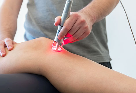 patient needing auto accident injury treatments in Sacramento with cold laser therapy