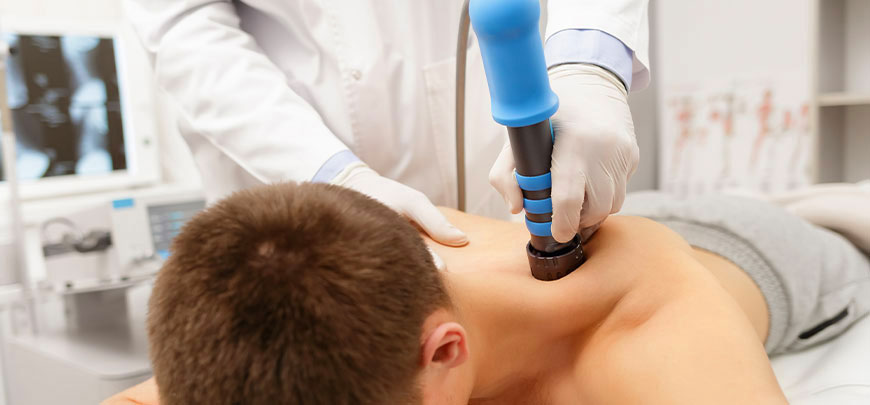 patient receiving shockwave therapy in Sacramento for auto accident injuries
