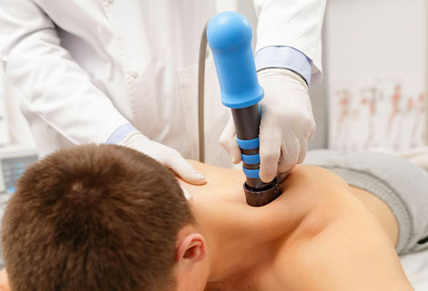 patient needing auto accident injury treatments in Sacramento with shockwave therapy