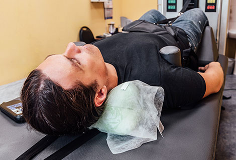 patient needing auto accident injury treatments in Sacramento with spinal decompression